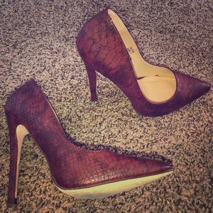 Burgundy snake skin pumps. Size 7.